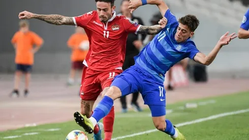 Liverpool sign Greece defender Tsimikas from Olympiakos