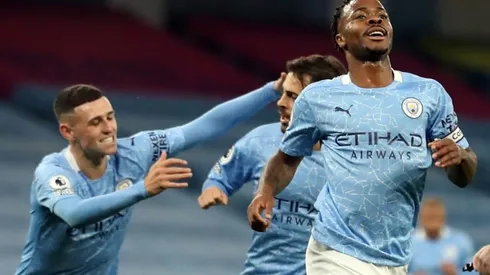 Sterling strike sees Man City hold off Arsenal