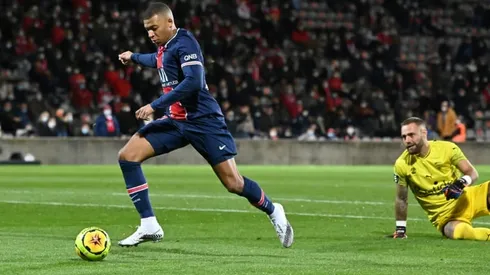 Tireless Mbappe sends PSG top with brace at Nimes