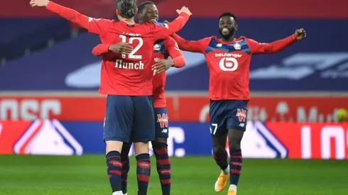 Lille sink Lorient to revive pursuit of PSG