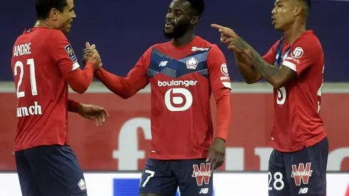 Unbeaten Lille held by stubborn 10-man Lyon