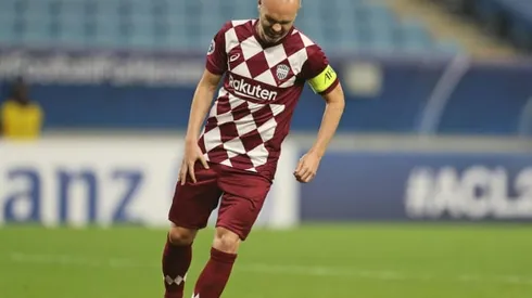 Ex-Barcelona star Iniesta vows to play on after surgery