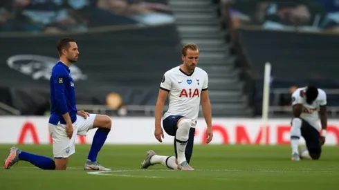 Kane says Premier League players should keep taking the knee in racism fight