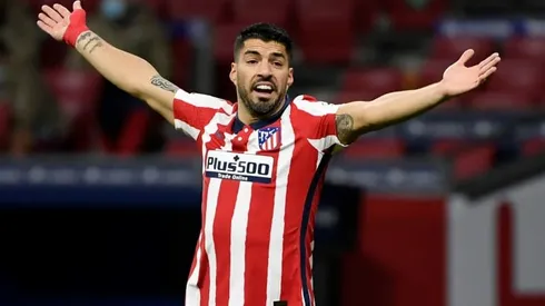 Suarez strikes again as Atletico march on with Valencia win