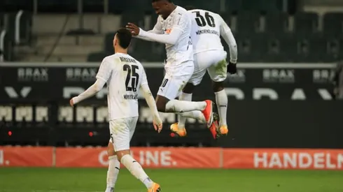 Gladbach end losing streak against Dortmund to climb to fourth