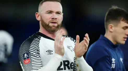 Rooney ends playing career to become full-time Derby boss