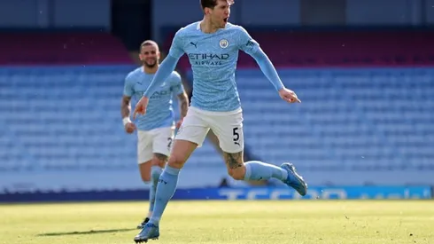 Stones sends Man City 13 points clear