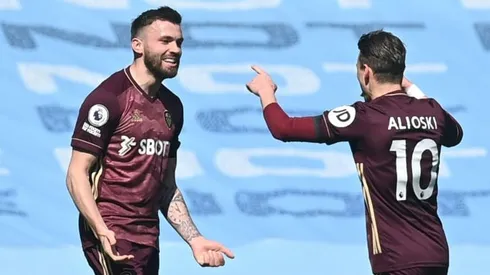 Dallas double sees 10-man Leeds shock Man City