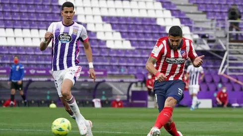 'Man of character' Suarez leads Atletico to La Liga as Real fall short