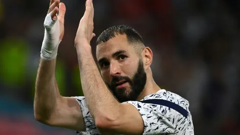 Benzema lifts pressure with first goals since France return