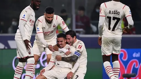 Milan beat nine-man Bologna to go top of Serie A