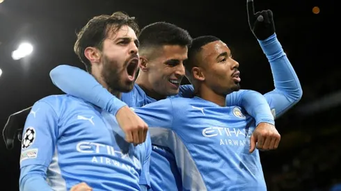 Man City take top spot, PSG through despite defeat