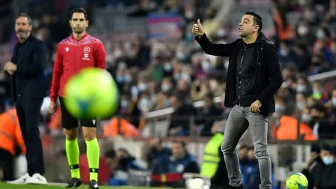 Barca edge past Espanyol to give Xavi debut victory as coach
