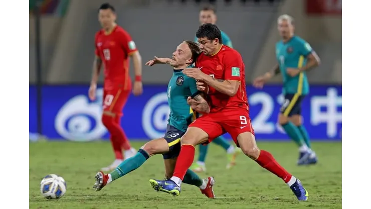 China hold Australia but face uphill task to reach World Cup