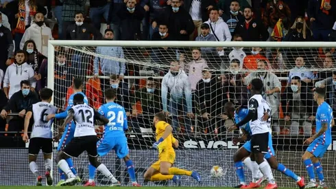 Atletico concede twice in injury time as Valencia snatch dramatic draw