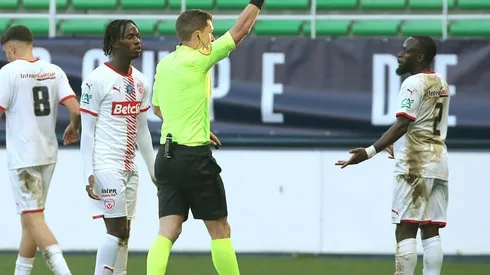 Eight-man Nancy survive French Cup siege at Troyes