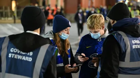 Sporting world battles surging Covid cases