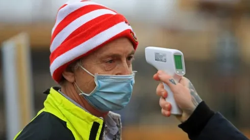 Fans face vaccine checks as Premier League battles Covid wave