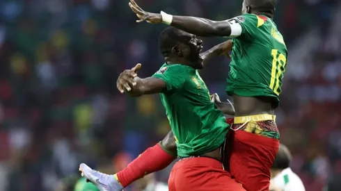 Hosts Cameroon light up Cup of Nations to qualify for knockout stages