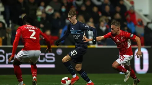 Man City shrug off Covid outbreak to thrash Swindon