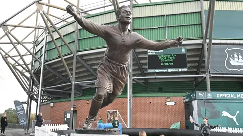 Family of first black footballer called up to England receives cap