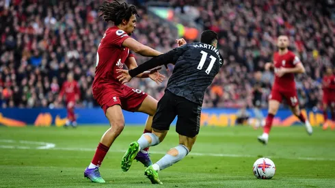 Arsenal's title hopes hurt as Liverpool comes from behind to draw