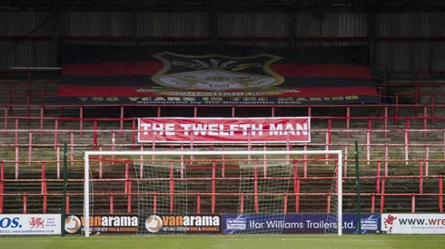 Wrexham reveals Kop delays as construction company goes bust