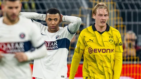 PSG survives fervid final day to reach Champions League last 16