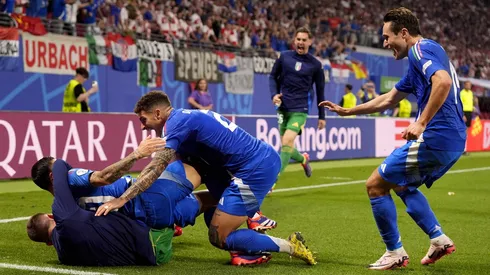 Italy wins knockout berth with 1-1 draw over Croatia