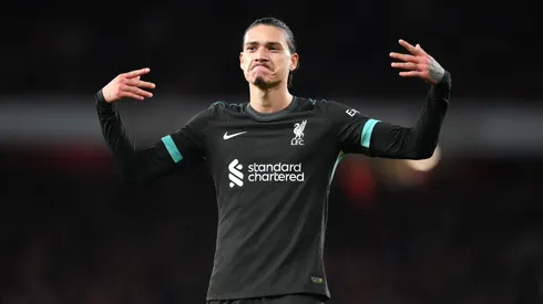 Liverpool sink to second after draw with Arsenal