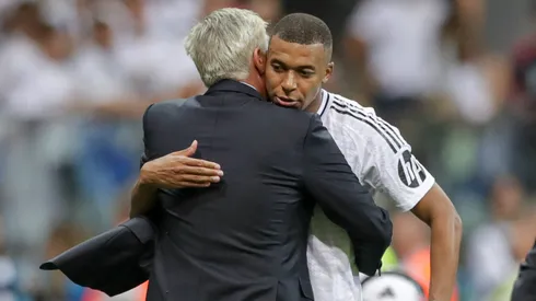 oach Carlo Ancelotti of Real Madrid (L) and Kylian Mbappe of Real Madrid seen in action during the UEFA SUPER CUP FINAL 2024 match between Real Madrid - Atalanta Bergamo at PGE National Stadium.