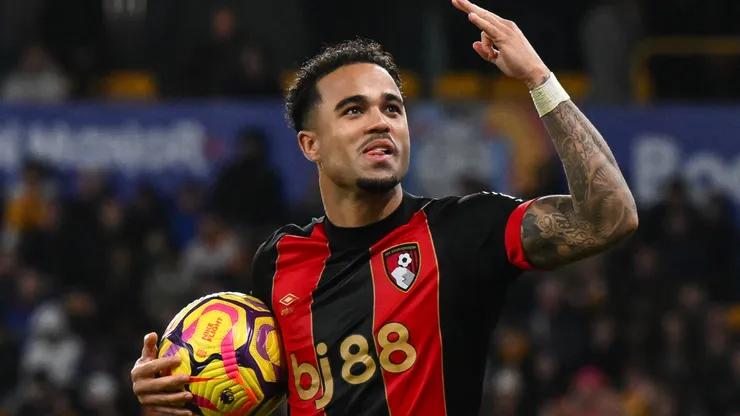 Justin Kluivert of Bournemouth celebrates scoring a penalty and completes his hat-trick making the score 2-4 during the Premier League match Wolverhampton Wanderers vs Bournemouth at Molineux, Wolverhampton, United Kingdom, 30th November 2024.