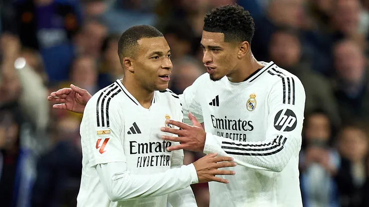 Kylian Mbappe and Jude Bellingham of Real Madrid interact during the LaLiga match between Real Madrid CF and FC Barcelona at Estadio Santiago Bernabeu on October 26, 2024 in Madrid, Spain.