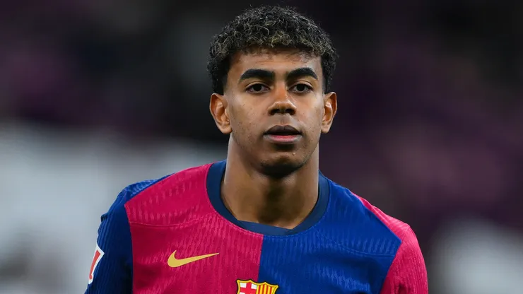 Lamine Yamal of FC Barcelona wears a special edition Coldplay match shirt during the LaLiga match between Real Madrid CF and FC Barcelona at Estadio Santiago Bernabeu on October 26, 2024 in Madrid, Spain.