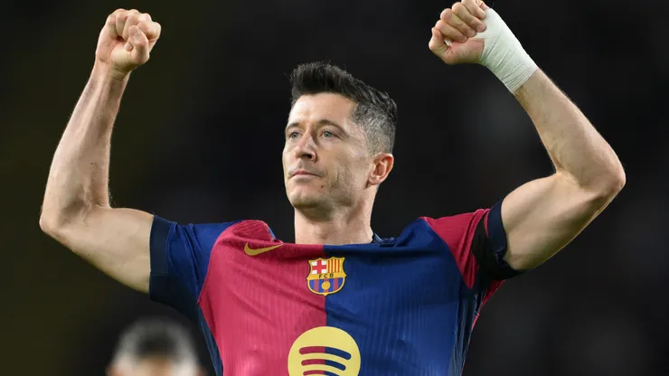Robert Lewandowski of FC Barcelona celebrates scoring his team's second goal during the La Liga EA Sports match between FC Barcelona and Sevilla FC.