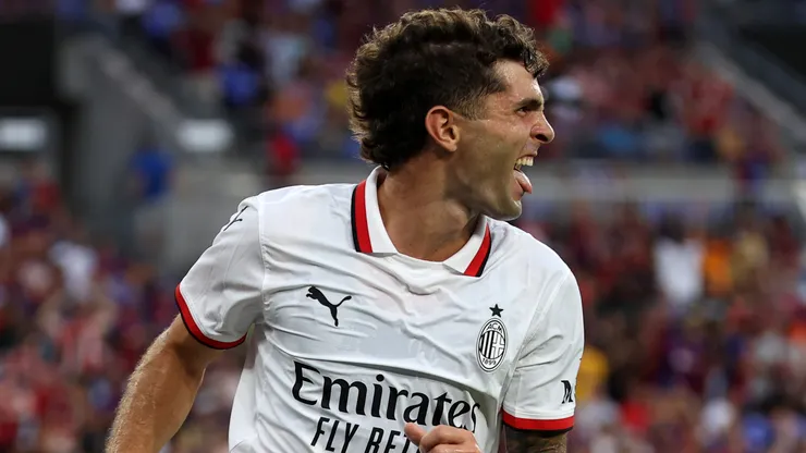 Christian Pulisic of AC Milan celebrates after scoring the team's second goal during a Pre-Season Friendly match between FC Barcelona and AC Milan at M&T Bank Stadium on August 06, 2024 in Baltimore, Maryland.