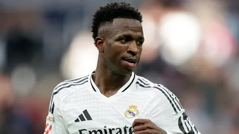 Vinicius Junior of Real Madrid celebrates scoring his team's fourth goal and completing his hat trick during the LaLiga match between Real Madrid CF and CA Osasuna at Estadio Santiago Bernabeu on November 09, 2024 in Madrid, Spain.