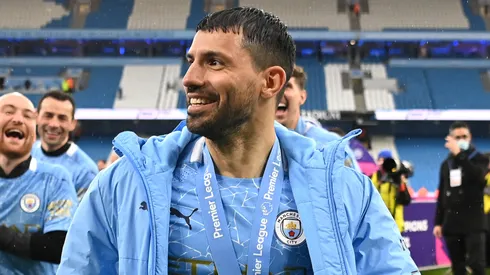 Sergio Aguero of Manchester City looks on after Manchester City are presented with the Trophy as they win the league following the Premier League match between Manchester City and Everton at Etihad Stadium on May 23, 2021 in Manchester, England. A limited number of fans will be allowed into Premier League stadiums as Coronavirus restrictions begin to ease in the UK.