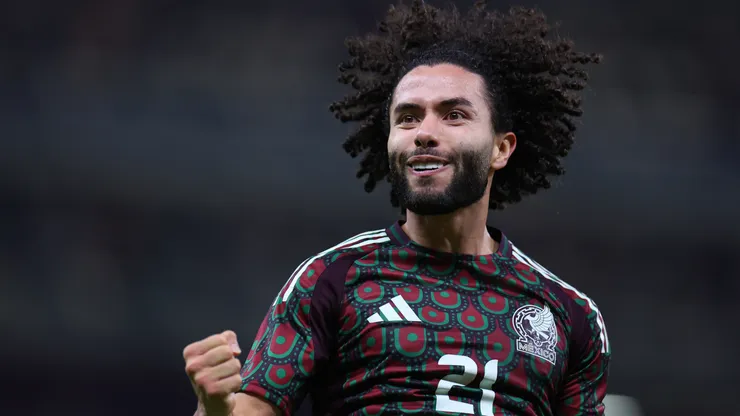 Cesar Huerta of Mexico celebrates after scoring a team's goal.