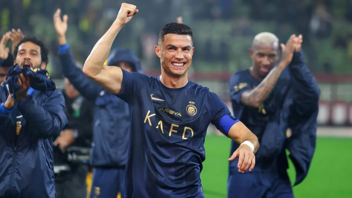 BURAYDAH, SAUDI ARABIA – DECEMBER 30: Cristiano Ronaldo of Al Nassr celebrates after winning the Saudi Pro League match between Al-Taawoun and Al-Nassr at King Abdullah Sport City Stadium on December 30, 2023 in Buraydah, Saudi Arabia. (Photo by Yasser Bakhsh/Getty Images)
