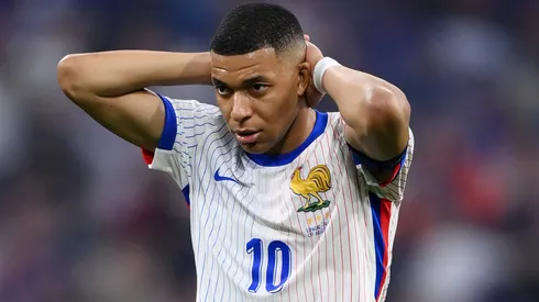 Kylian Mbappe of France reacts during the UEFA EURO 2024 Semi-Final match between Spain and France at Munich Football Arena on July 09, 2024 in Munich, Germany.