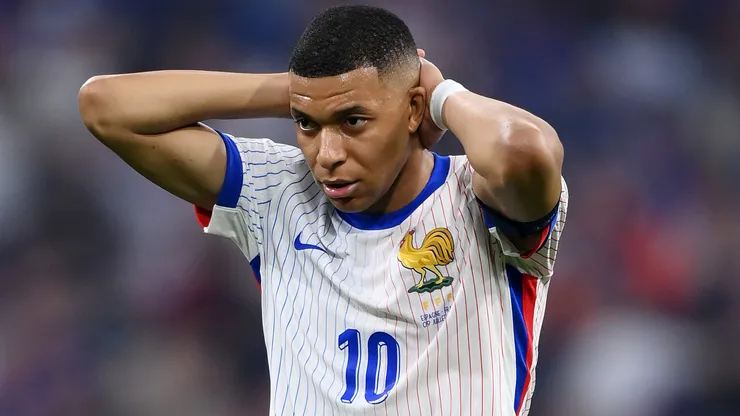 Kylian Mbappe of France reacts during the UEFA EURO 2024 Semi-Final match between Spain and France at Munich Football Arena on July 09, 2024 in Munich, Germany.