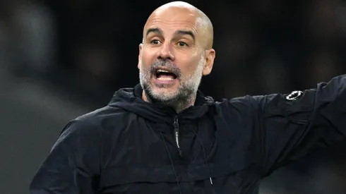 Pep Guardiola, Manager of Manchester City, reacts during the Carabao Cup Fourth Round match between Tottenham Hotspur and Manchester City at Tottenham Hotspur Stadium on October 30, 2024 in London, England.