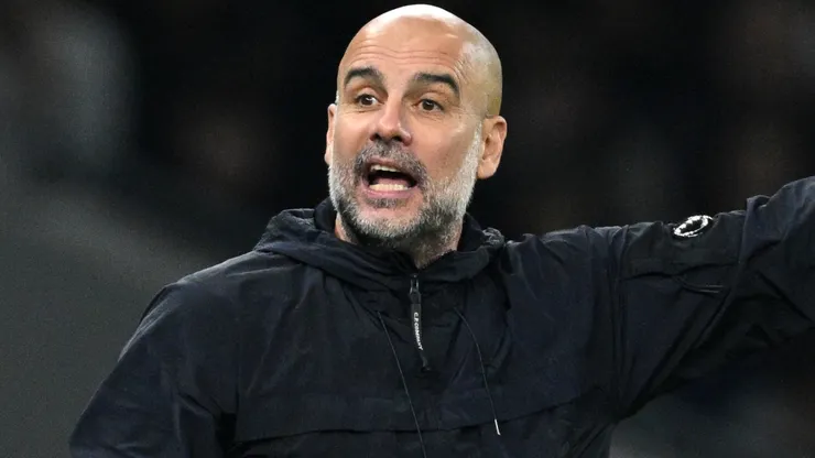 Pep Guardiola, Manager of Manchester City, reacts during the Carabao Cup Fourth Round match between Tottenham Hotspur and Manchester City at Tottenham Hotspur Stadium on October 30, 2024 in London, England.