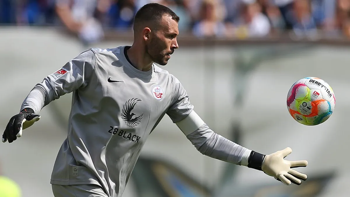 goalkeeper kicking ball