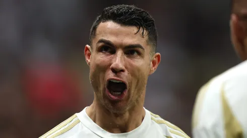 Cristiano Ronaldo of Al-Nassr celebrates scoring his team's first goal during the AFC Champions League Elite match between Al-Gharafa and Al-Nassr at Al Bayt Stadium on November 25, 2024 in Al Khor, Qatar.