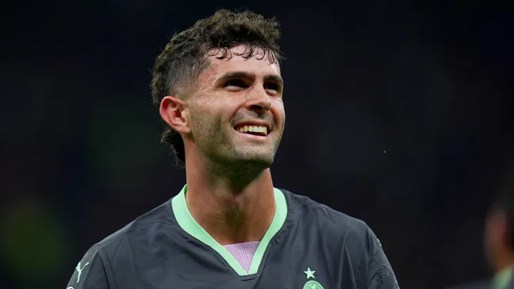 AC Milan s Christian Pulisic celebrates after scoring 1 0 during the Uefa Champions League soccer match between Ac Milan and Club Brugge a at the San Siro Stadium in Milan.