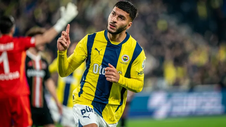 Oguz Aydin of Fenerbahce celebrates his teams first goal during a match.