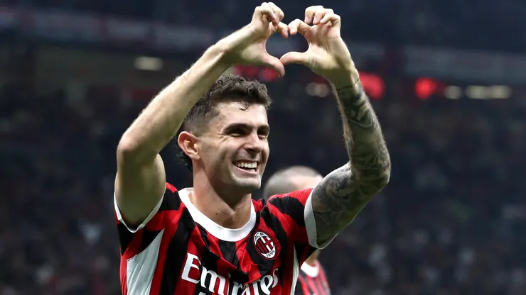 Christian Pulisic of AC Milan celebrates scoring his team's third goal during the Serie A match between AC Milan and US Lecce at Stadio Giuseppe Meazza on September 27, 2024 in Milan, Italy.