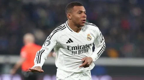 Kylian Mbappe of Real Madrid celebrates scoring his team's first goal during the UEFA Champions League 2024/25 League Phase MD6 match between Atalanta BC and Real Madrid C.F. at Stadio di Bergamo on December 10, 2024 in Bergamo, Italy.